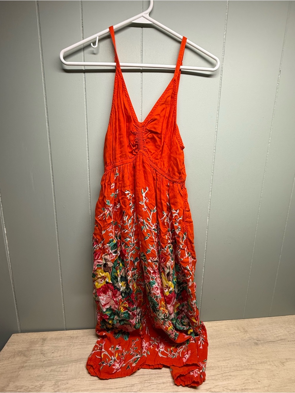 Cyn by Cynthia Mehra Orange Floral Midi Dress with V-Neck and Spaghetti Straps
